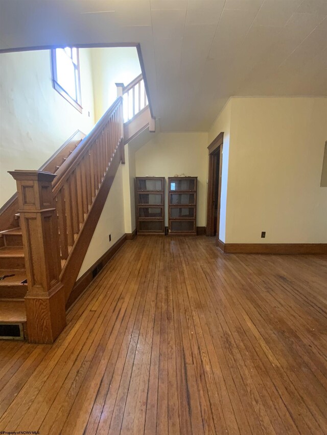 unfurnished living room featuring light hardwood / wood-style flooring