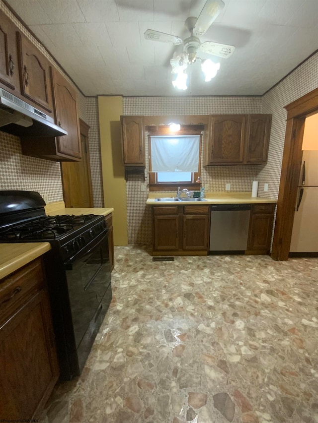 kitchen featuring dishwasher, black gas stove, sink, ceiling fan, and white fridge