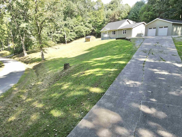 view of front of home with a shed and a front lawn