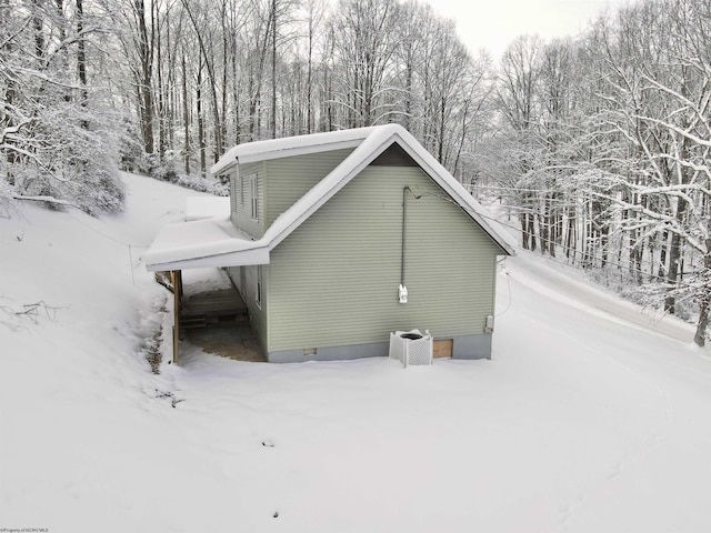 view of snow covered property