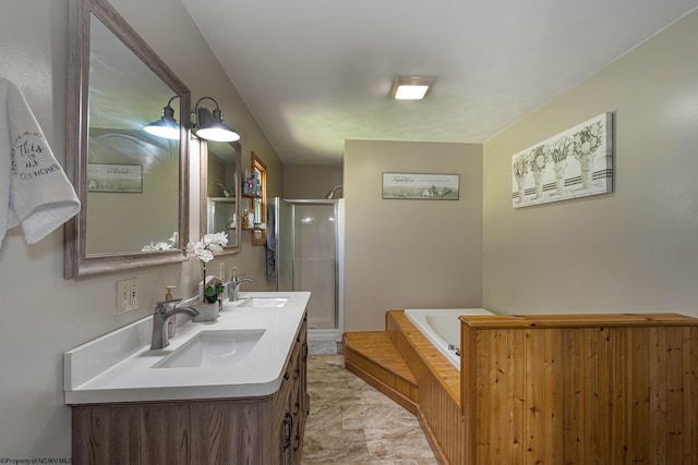 bathroom with tile patterned flooring, separate shower and tub, and vanity