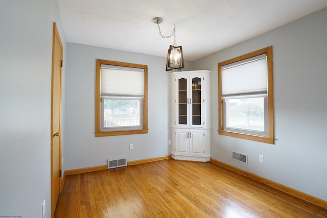 empty room with light wood-type flooring