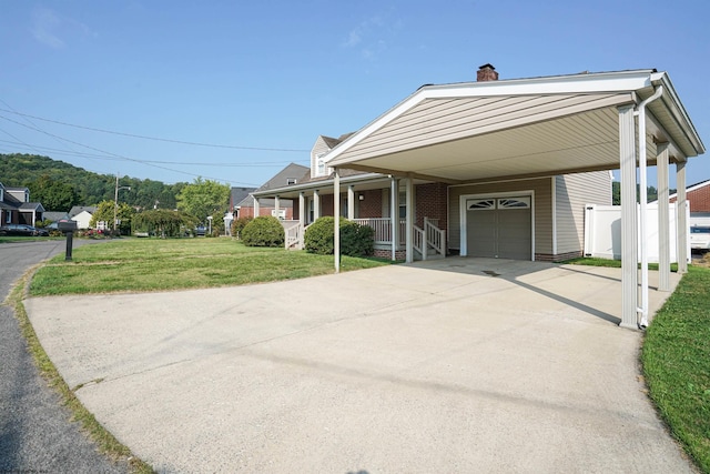 view of front of house featuring a garage, a front yard, covered porch, and a carport