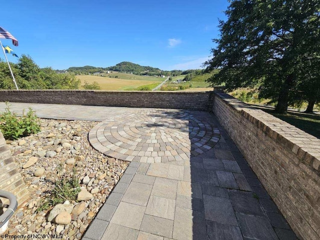 view of patio with a mountain view