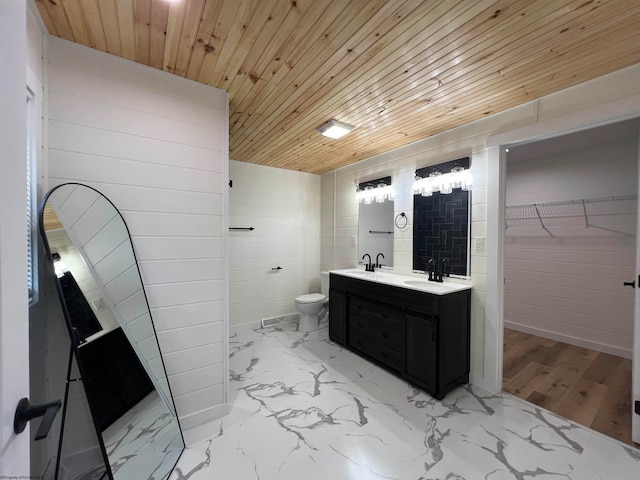 bathroom featuring wooden ceiling, vanity, and toilet