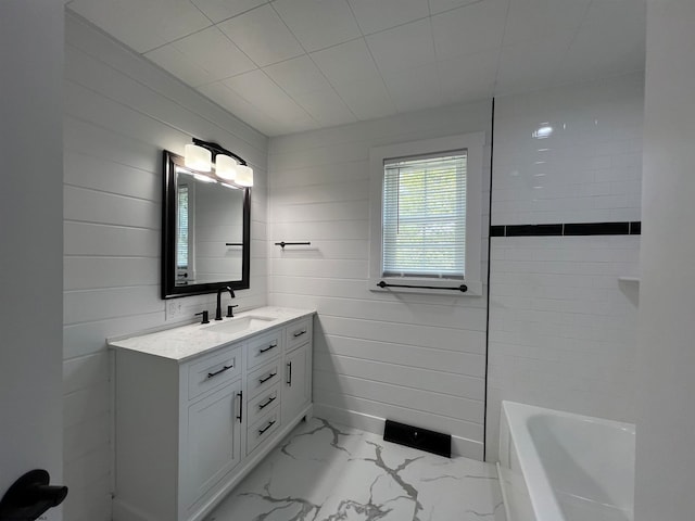 bathroom with plus walk in shower and vanity