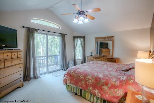 bedroom with light colored carpet, ceiling fan, vaulted ceiling, and access to outside