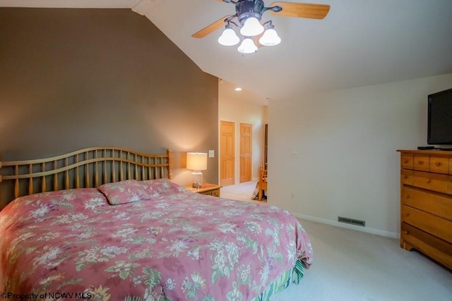 bedroom featuring lofted ceiling, ceiling fan, and carpet floors