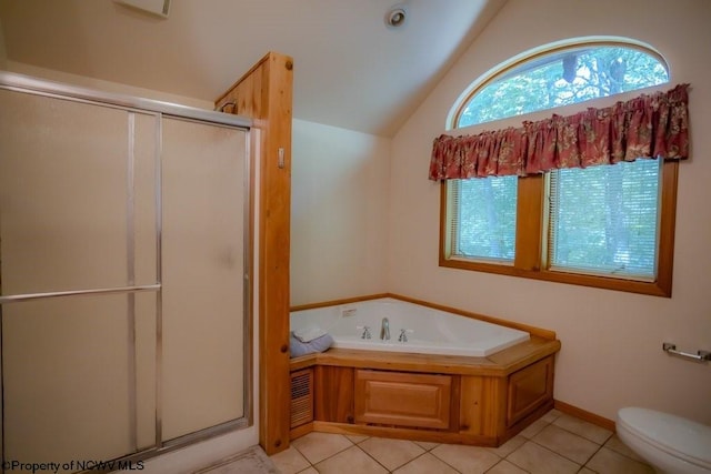 bathroom featuring lofted ceiling, toilet, separate shower and tub, and tile patterned flooring