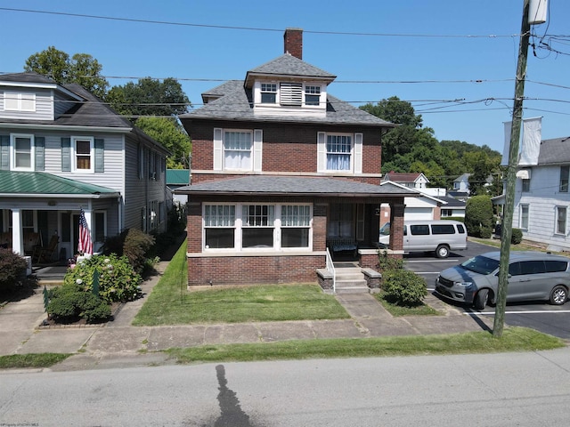 view of front of property featuring covered porch