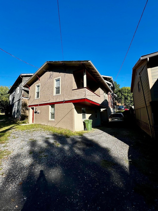 view of side of property featuring a garage