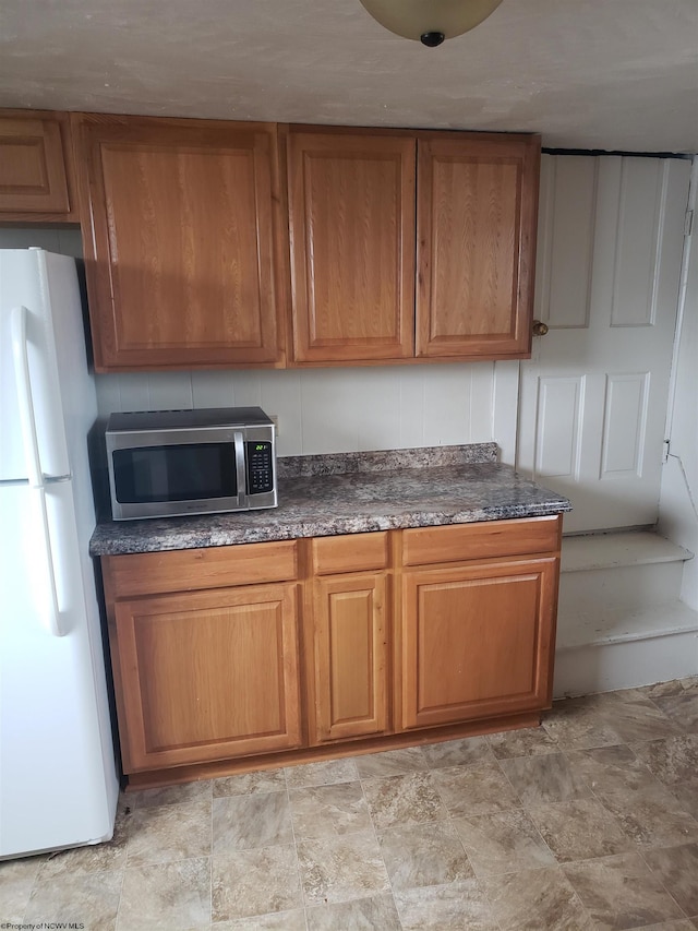 kitchen with white fridge