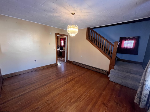 interior space featuring baseboards, stairway, wood finished floors, an inviting chandelier, and a baseboard heating unit