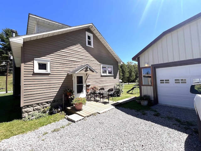 exterior space featuring a garage and board and batten siding