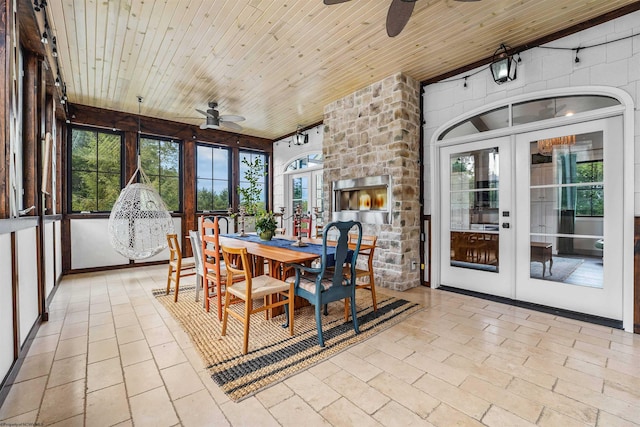 interior space with ceiling fan, wood ceiling, and french doors