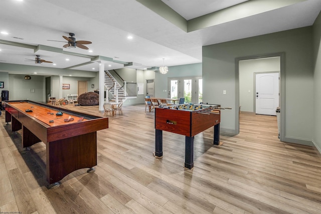 game room with light hardwood / wood-style flooring and ceiling fan