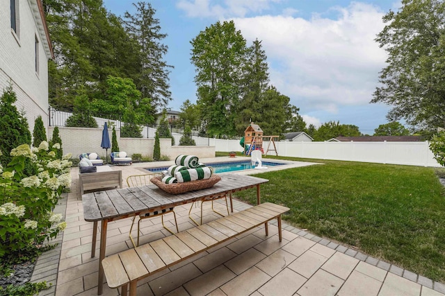 view of patio / terrace featuring a fenced in pool