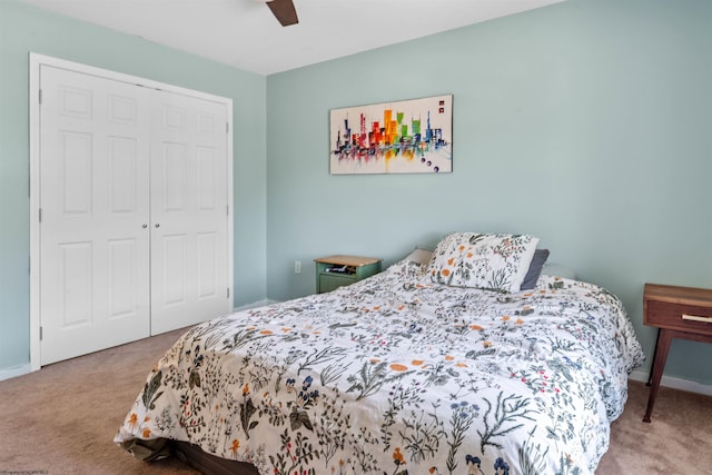 bedroom featuring carpet flooring, a closet, and ceiling fan