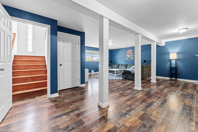 basement featuring dark hardwood / wood-style floors