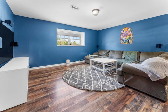 living room featuring dark hardwood / wood-style floors