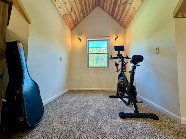 exercise room with wood ceiling, carpet, and vaulted ceiling