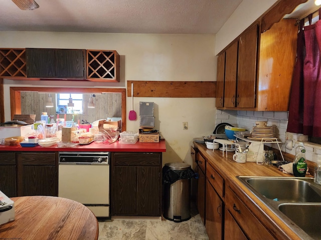 413 Green Acres Cir, Spencer, WV 25276 - kitchen featuring dishwasher, a textured ceiling, backsplash, and a sink