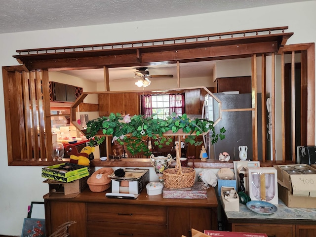 413 Green Acres Cir, Spencer, WV 25276 - kitchen with a textured ceiling and ceiling fan