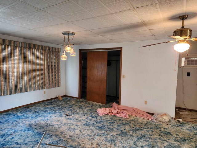 413 Green Acres Cir, Spencer, WV 25276 - carpeted spare room featuring baseboards and a ceiling fan