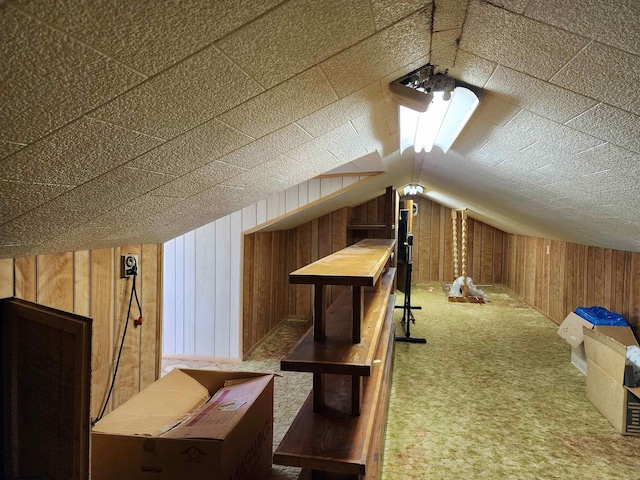 413 Green Acres Cir, Spencer, WV 25276 - bonus room featuring lofted ceiling, wooden walls, and carpet floors
