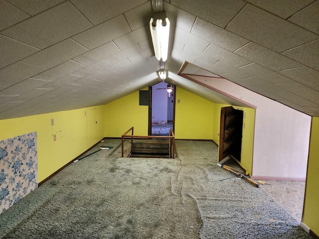 413 Green Acres Cir, Spencer, WV 25276 - additional living space featuring baseboards, lofted ceiling, and carpet flooring