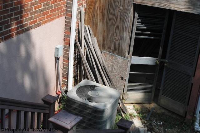 413 Green Acres Cir, Spencer, WV 25276 - exterior details with central AC unit