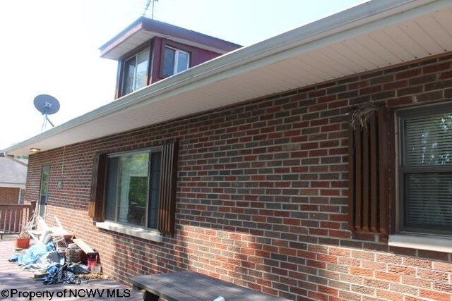 413 Green Acres Cir, Spencer, WV 25276 - view of property exterior with brick siding