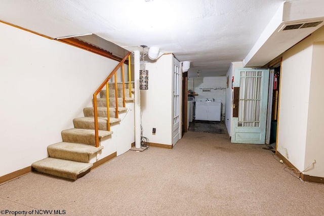 stairway featuring carpet floors