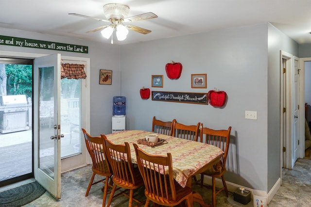 dining area with french doors and ceiling fan