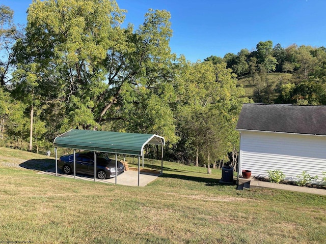 view of yard with a carport