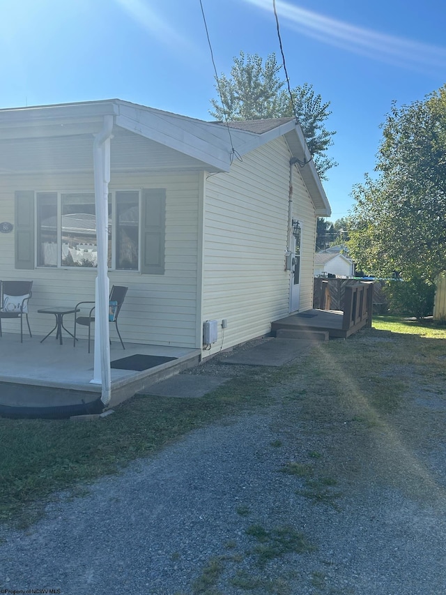 view of home's exterior with a deck