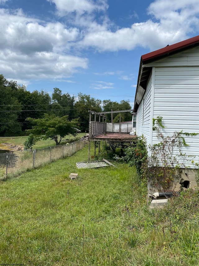 view of yard with a deck