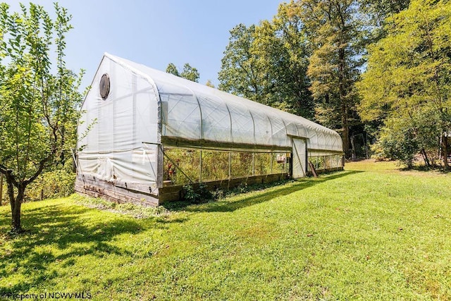 exterior space with a lawn