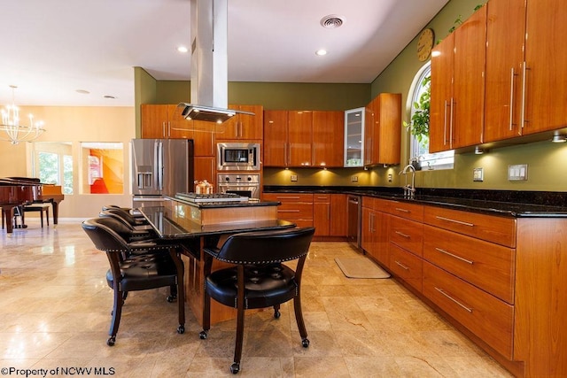 kitchen with a notable chandelier, visible vents, appliances with stainless steel finishes, and brown cabinets