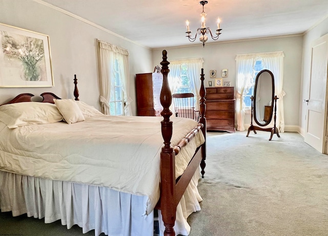 carpeted bedroom with crown molding and a chandelier