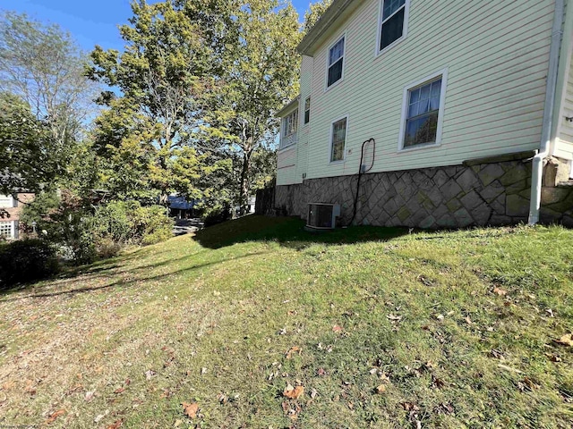 view of yard featuring central AC