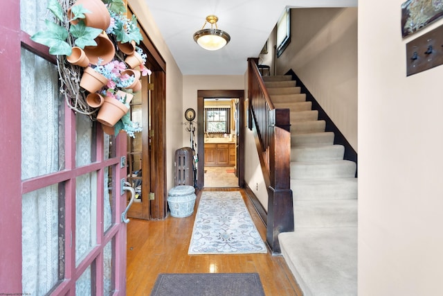 entrance foyer with light wood-type flooring