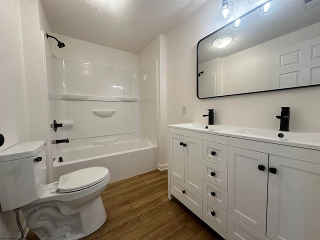 full bathroom with vanity, toilet, bathtub / shower combination, and wood-type flooring