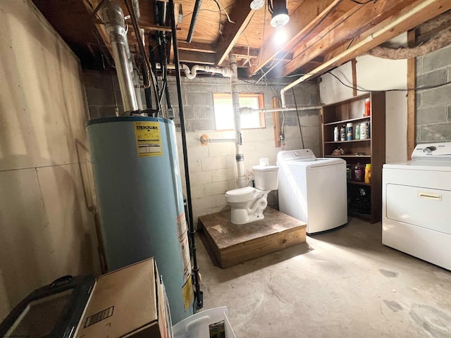 basement with separate washer and dryer and water heater