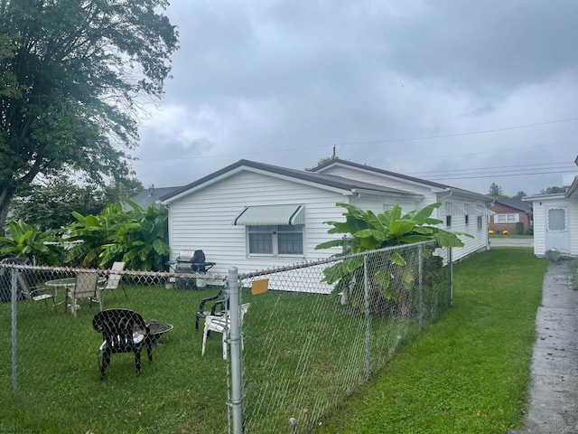 exterior space with a front yard