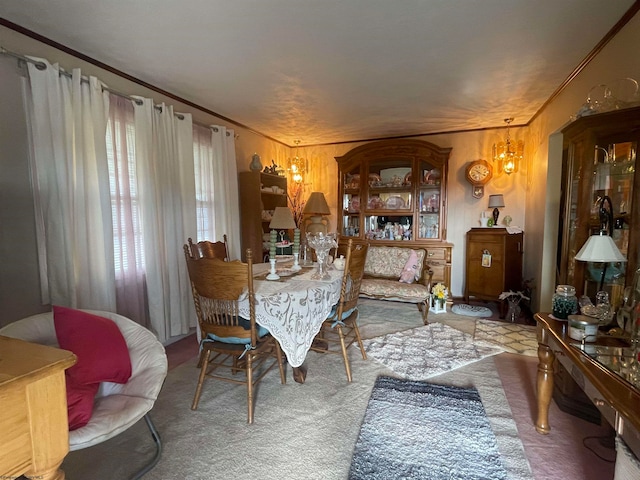 carpeted dining area featuring crown molding