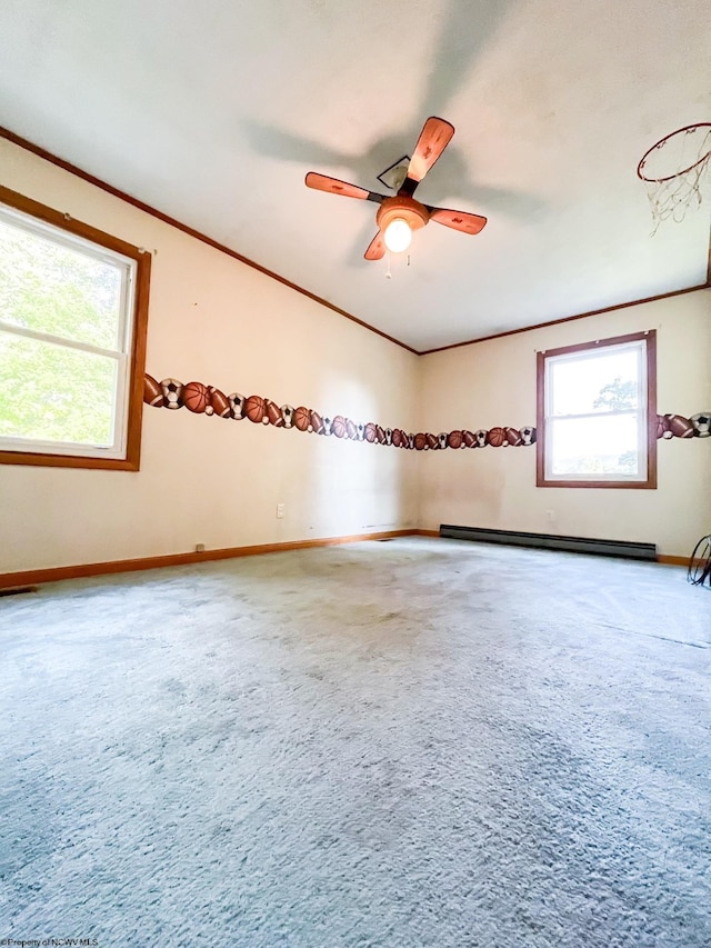 unfurnished room with crown molding, a baseboard radiator, ceiling fan, and carpet