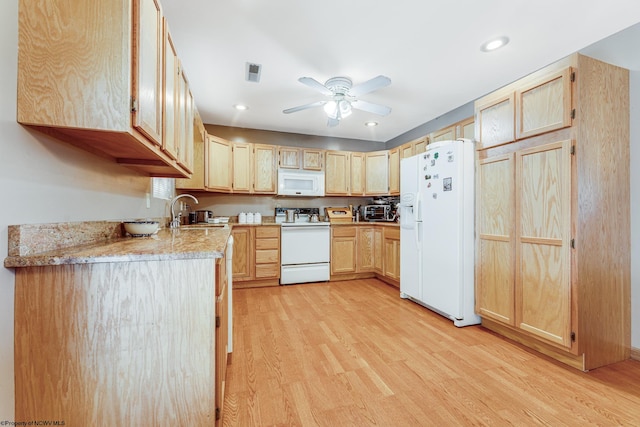 kitchen with white appliances, light hardwood / wood-style flooring, light brown cabinetry, and ceiling fan