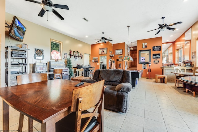 dining room with ceiling fan and light tile patterned floors