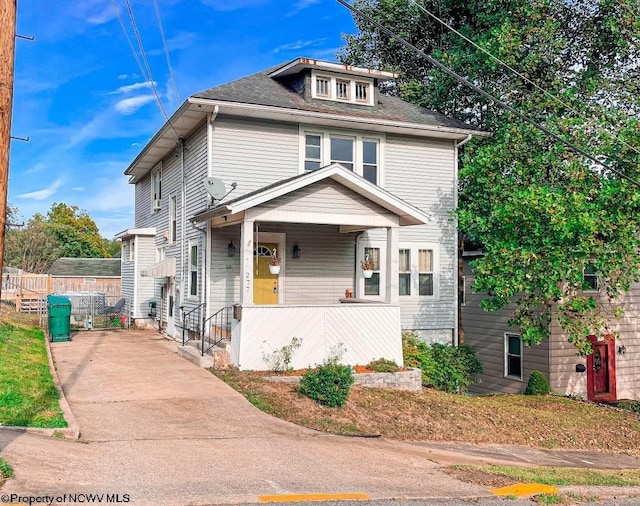 view of front property featuring a porch